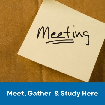 Yellow Post-It Note with Meeting Written
