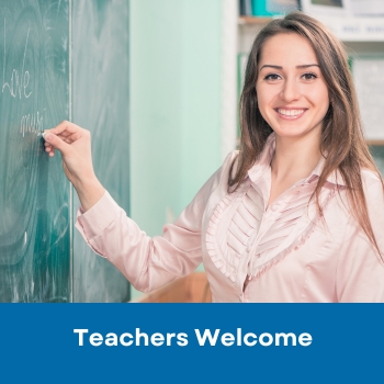Teacher at chalkboard